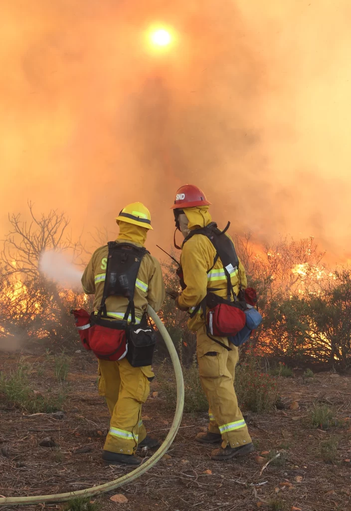 SMC Coco's IC 2014 - Two firefighters battling a fire - © San Diego Regional Fire Foundation